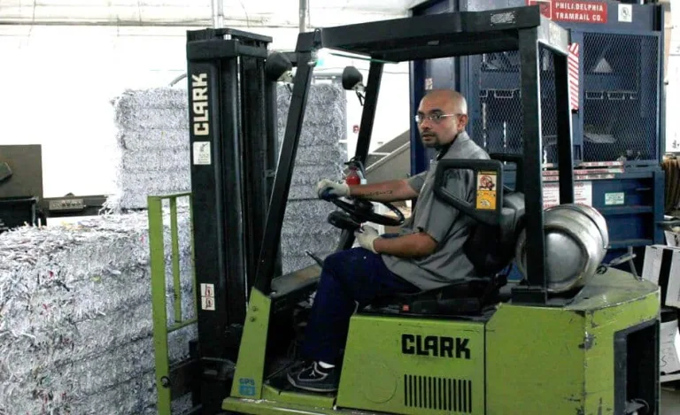 Employee on a fork lift